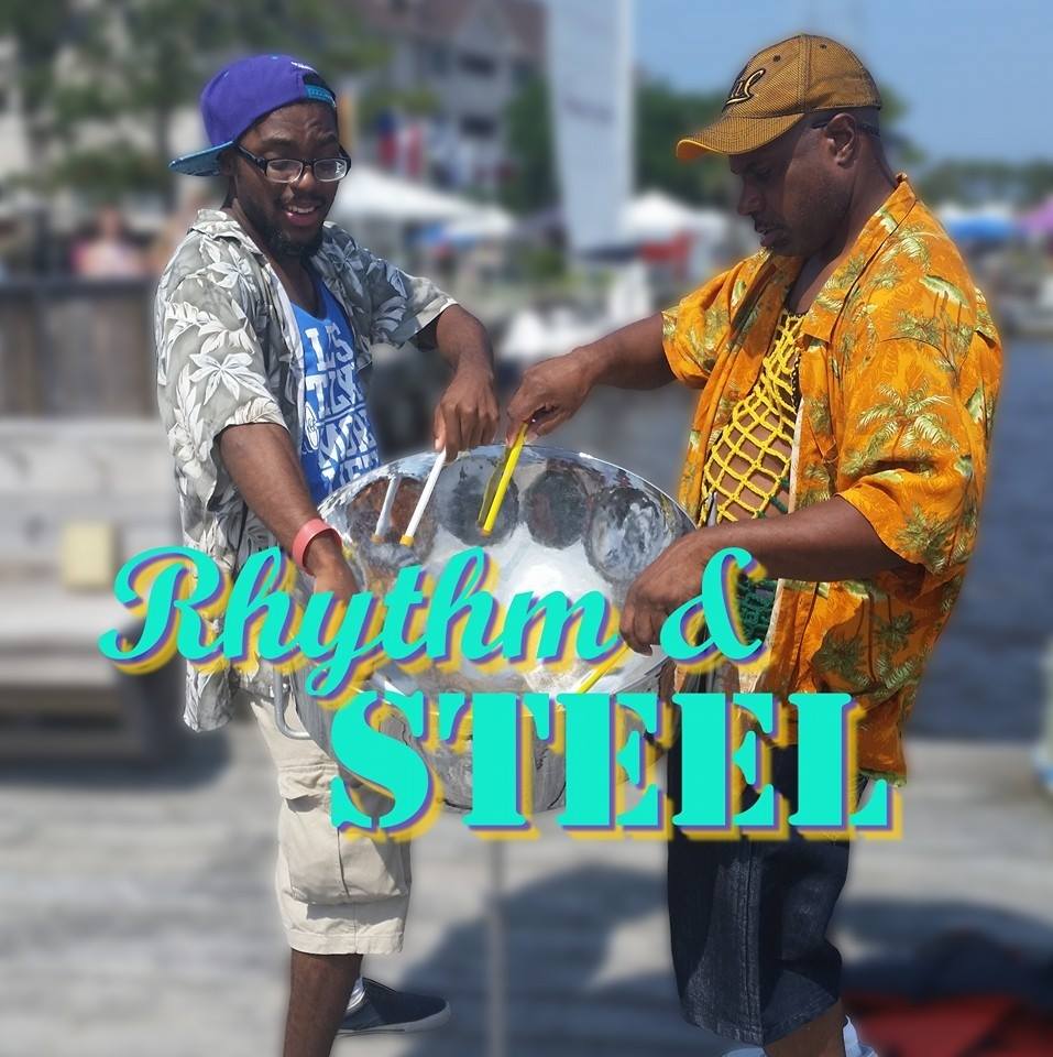 Two men with a steel drum