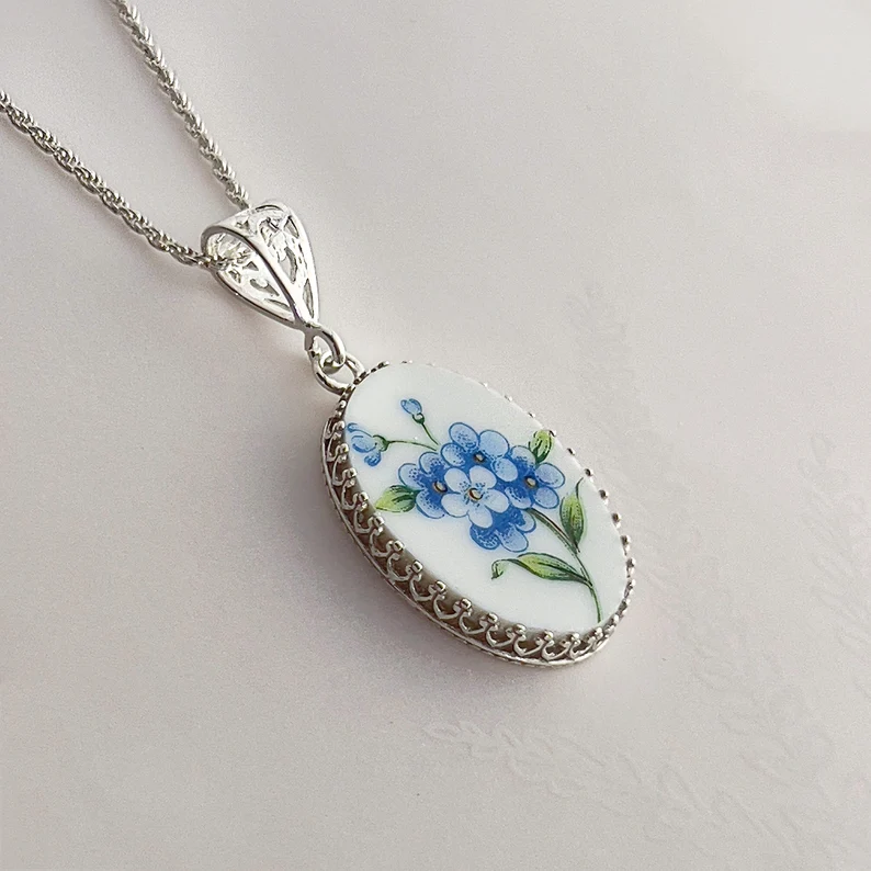 Flowers painted onto a pendant