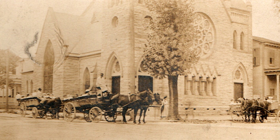 Cepiatone photo of church with horse drawn carriange in front