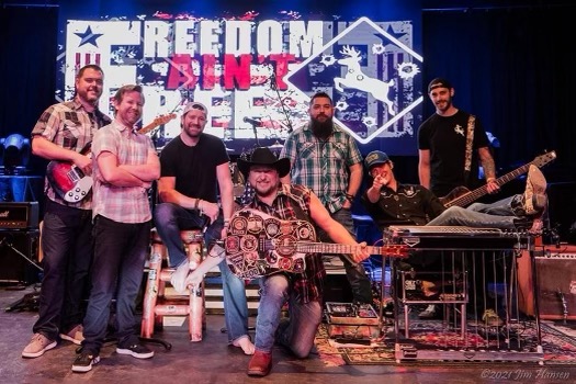 Band Photo with Freedom Ain't Free backdrop