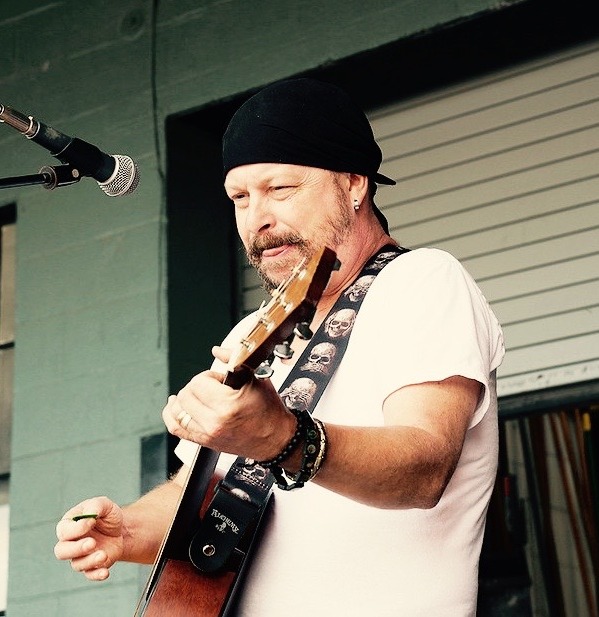 Joe Heilman playing guitar