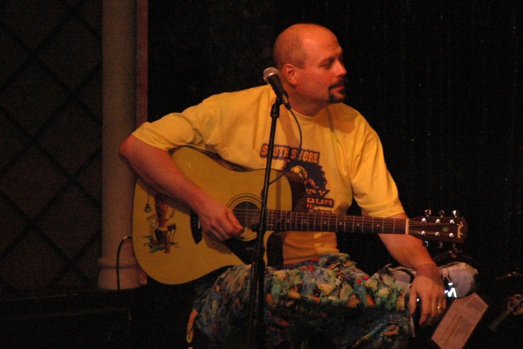 Robbie Mead playing guitar