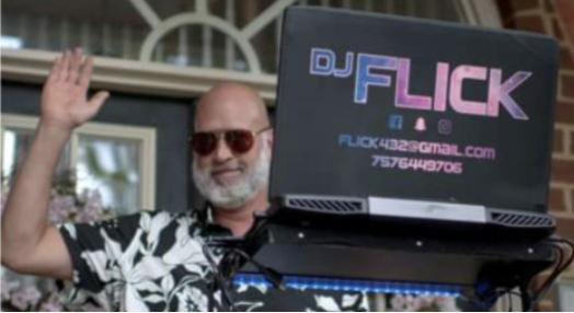 DJ Flick waving