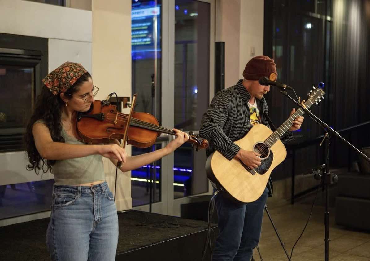 The Ground Below showing guitar and violin players